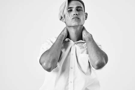 handsome man in white shirt fashion hairstyle studio lifestyleの写真素材