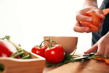 cutting vegetables in the kitchen cooking ingredients vitamins. High quality photoの写真素材