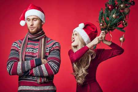 man and woman in holiday christmas fun decoration toysの写真素材