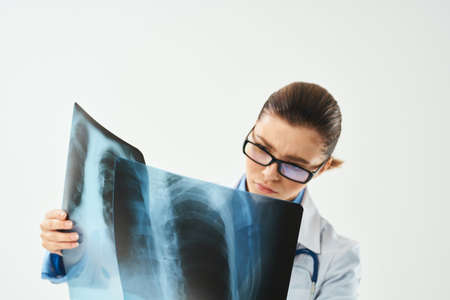 the radiologist looks at the x-ray diagnosis to a professional the results