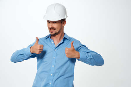 Male builder white helmet work professional industry