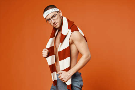 handsome man with glasses nude torso posing fashion sexyの写真素材