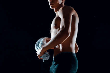 man in black shorts pumped up body workout fitness motivationの写真素材