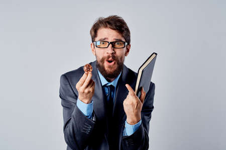 business man in a suit cryptocurrency bitcoin research technology electronic walletの写真素材