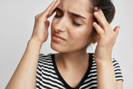 brunette with headache health problems medicine stress