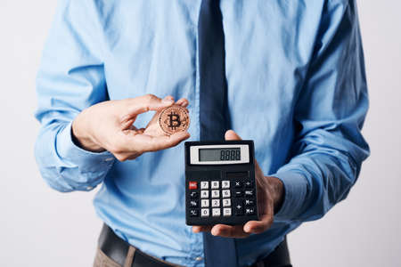 gold coin calculator cryptocurrency then economyの写真素材