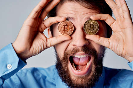 Cheerful business man finance cryptocurrency economy electronic moneyの写真素材