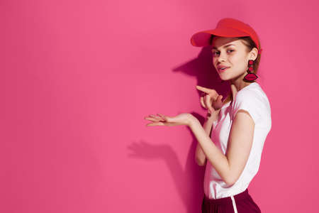 Glamorous Woman Red Caps Posing Summerの写真素材