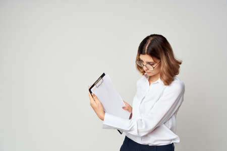 Business woman with folder in hands Copy Space officeの写真素材