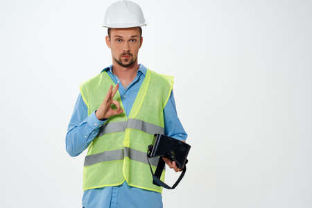 man in working uniform building vr glassesの写真素材