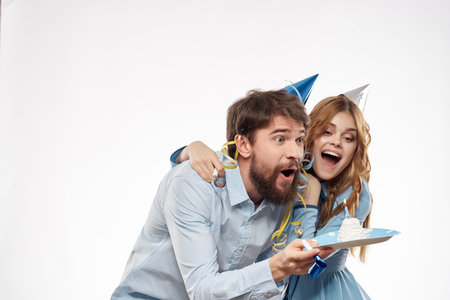 funny man and woman plate with cake holiday party birthdayの写真素材