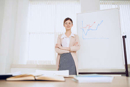 Business woman in office work schedule presentation