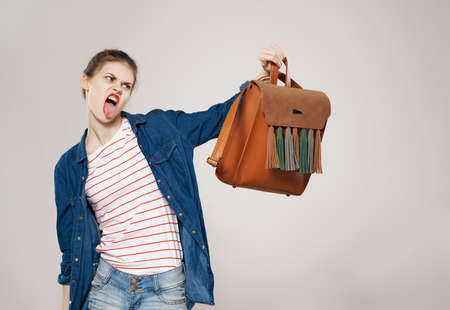 pretty woman with backpacker fashion studentsの写真素材
