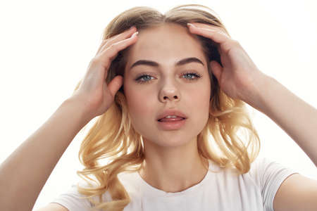 beautiful woman makeup posing light background