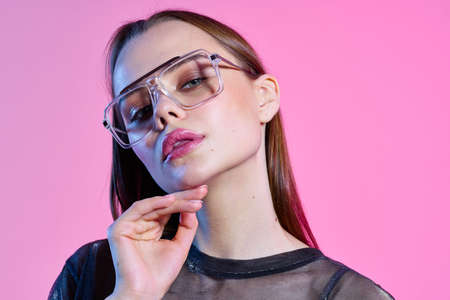 woman wearing glasses fashion cosmetics bright makeup glamor