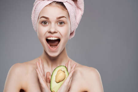 pretty woman bare shoulders after shower exotic in hand cropped view