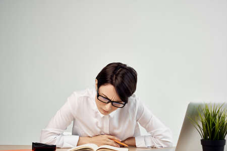 woman in costume in front of laptop Secretary executive Studio Lifestyleの写真素材
