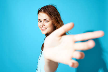 pretty woman in a blue dress isolated background attractive look