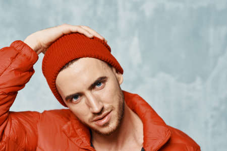 fashionable man in red jacket nude body studioの写真素材