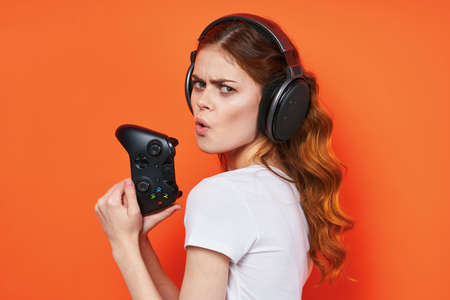 woman t-shirts joysticks games entertainment technologyの写真素材