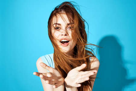 portrait of a woman in a blue dress blue background Lifestyleの写真素材