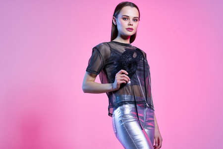 attractive woman in fashionable clothes neon disco night club