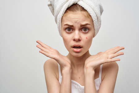 beautiful woman with a towel on my head hygiene treatmentの写真素材