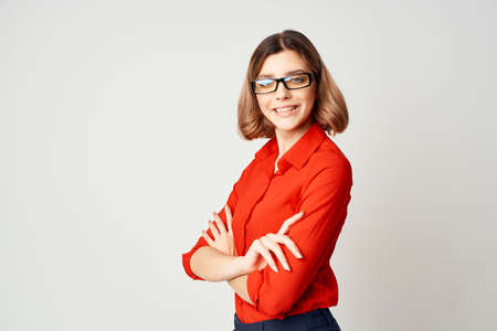 Business woman in red shirt fun emotions work secretaryの写真素材