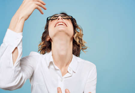 Business woman wearing glasses emotions gestures hands close-up officeの写真素材