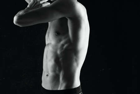 athletic man with a pumped up body workout motivation exerciseの写真素材