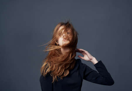 woman in black dress beautiful hairstyle fashion lifestyle glamorの写真素材