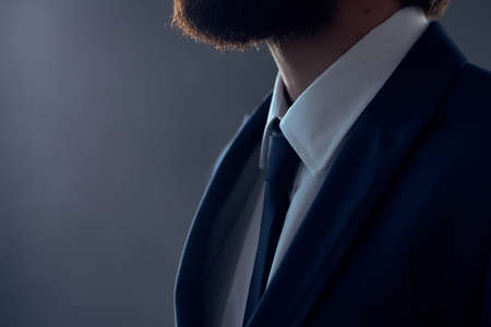 The man in a suit executive office isolated backgroundの写真素材