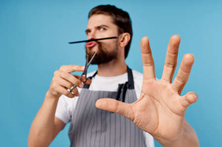 male hairdresser scissors comb Professionalの写真素材