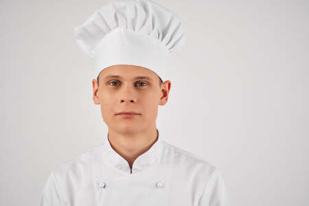 a man in a chefs uniform self-confidence professionals workの写真素材