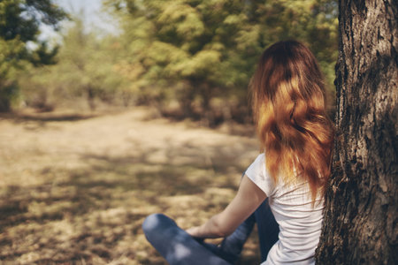 pretty woman rest in the countryside landscapeの写真素材