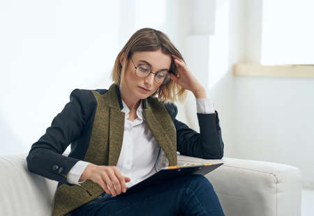 pretty woman sitting in office work recording professionalsの写真素材