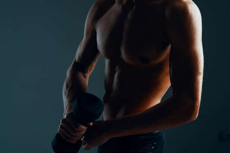 man with a pumped up body exercise muscle workoutの写真素材