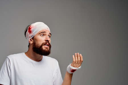 patient in a white t-shirt trauma health diagnosis isolated backgroundの写真素材