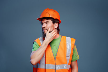 bearded man hard profession construction engineer close-upの写真素材
