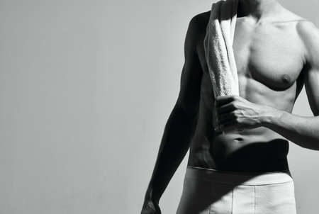 bodybuilder posing muscular torso workout fitnessの写真素材