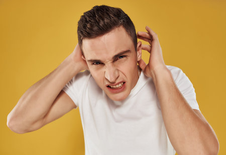 man gesturing with hands in white t-shirt cropped view isolated backgroundの写真素材