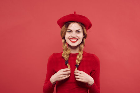 pretty woman with pigtails fun Red lips luxury isolated backgroundの写真素材
