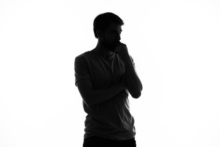 man in shadow gesture hands posing lifestyle anonymousの写真素材