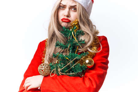 pretty woman dressed as santa christmas holiday posing decorationの写真素材