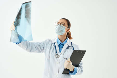 female doctor with x-ray in hands examination diagnostics hospital