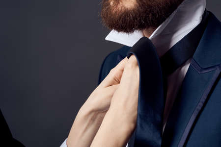 business man in suit tie knot self confidenceの写真素材