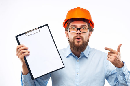 surprised man documents in hand and drawings Studio hand gestureの写真素材