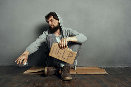 homeless bearded man on earth begging money problemの写真素材