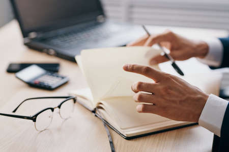 manager working for a laptop in the office emotions officialの写真素材