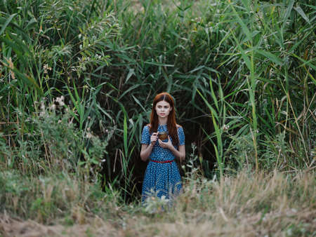woman in dress nature fresh air freedom posing